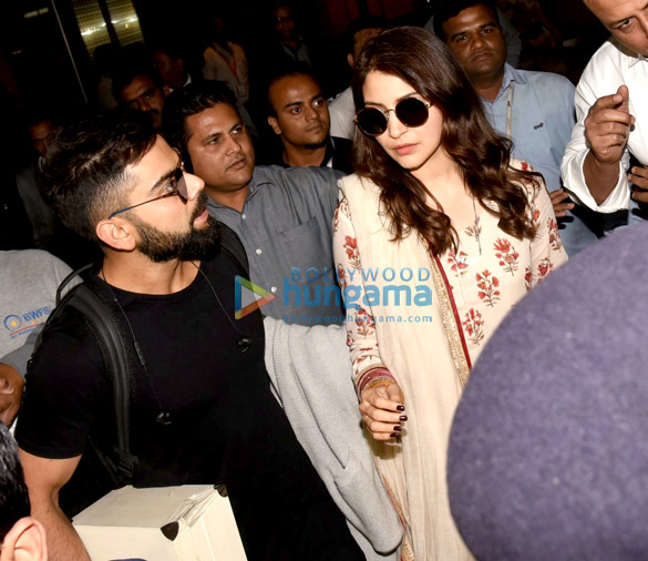Virat Kohli and Anushka Sharma arrive in Mumbai Anushka Sharma and Virat Kohli snapped at the airport