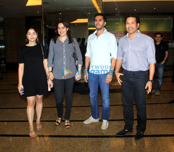 Sachin Tendulkar snapped with his family at Rang Mandir in Bandra Sachin Tendulkar snapped with his family at Rang Mandir in Bandra