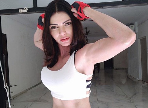 Sherlyn Chopra does the perfect handstand during her Yoga session