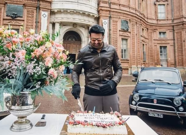 Check out: Prabhas cuts his birthday cake on the sets of Radhe Shyam in