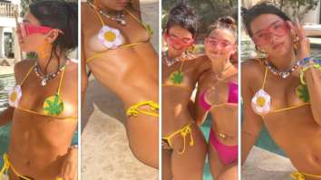 Dua Lipa shows off her tan in a skimpy bikini as she holidays in Ibiza