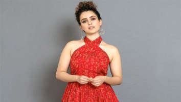 Sanya Malhotra glows in a beautiful red halter neck dress worth Rs. 16,500