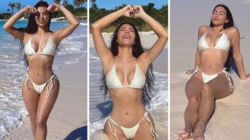 Kim Kardashian flaunts her curves in sultry white bikini; fans are convinced the latest Bahamas photos are taken by Pete Davidson
