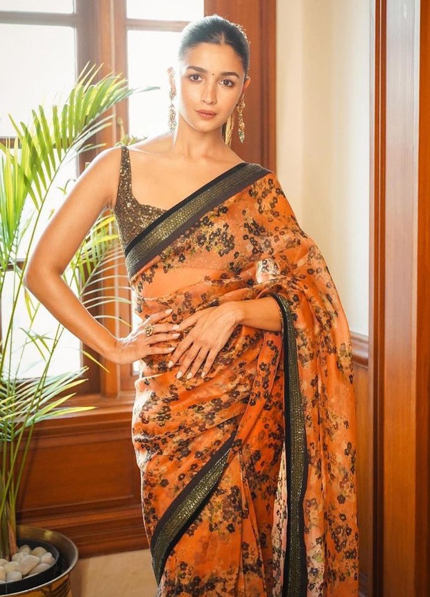 Alia Bhatt has to do with the elegance of Sabyasachi Mukherjee peach organza saree as she promotes RRR in Delhi with SS Rajamouli, Ram Charan and Jr.  NT