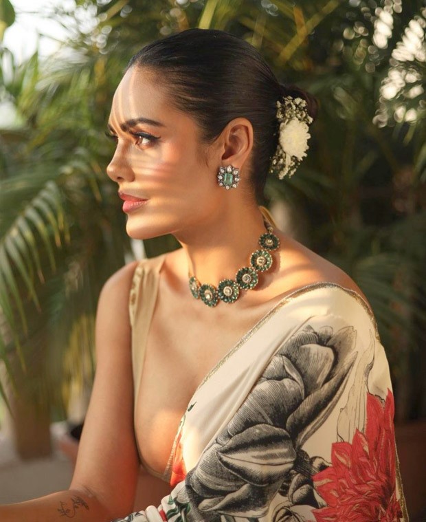 Esha Gupta looks scintillating in Rohit Bal's floral saree and beige deep neck blouse