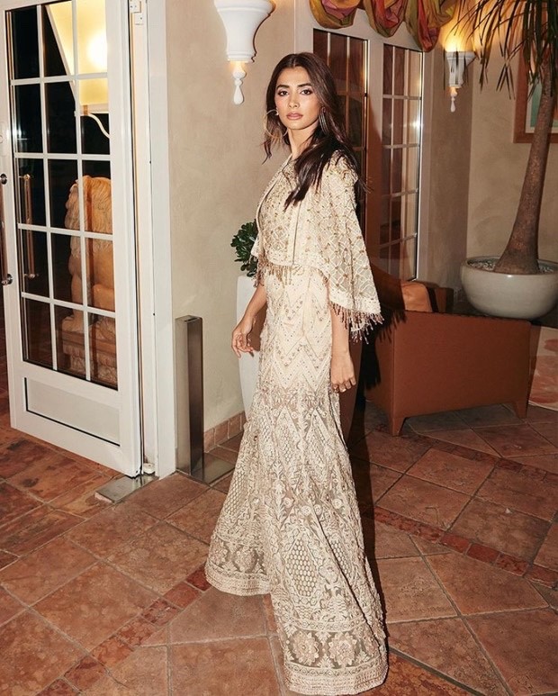 Cannes 2022: Pooja Hegde flaunts her style game in a cream jumpsuit and embellished cropped cape worth Rs. 3.3 lakh