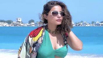 Hina Khan turns into beach babe in a green cut-out bikini and vibrant cape while on vacation in Abu Dhabi