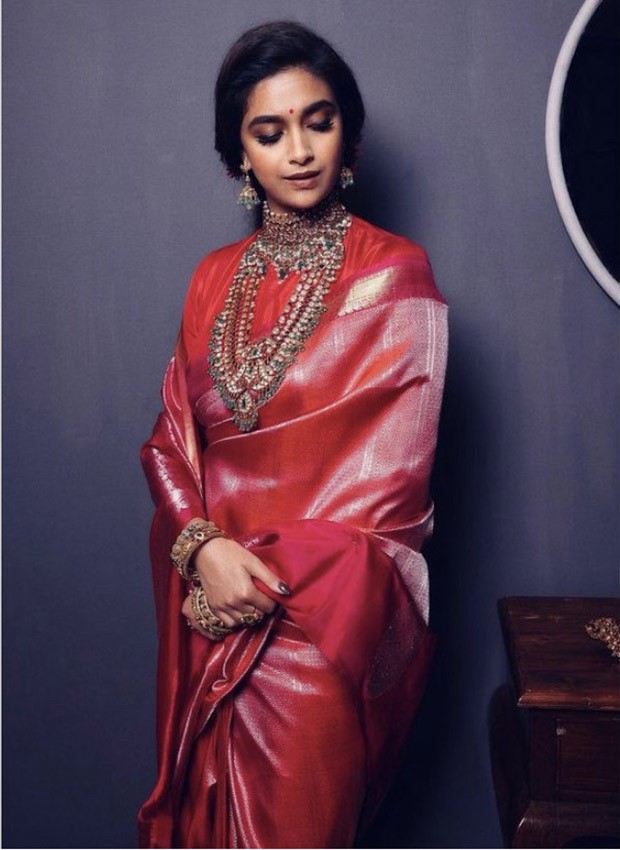 Keerthy Suresh glams up like a pro in red saree for Joyalukkas jewellery campaign