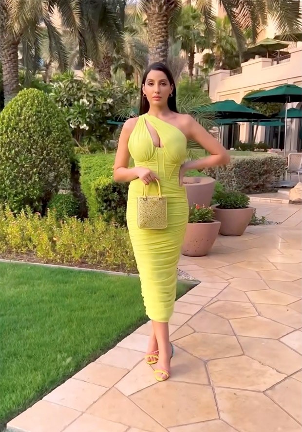Nora Fatehi keeps it trendy in neon green one shoulder body-con dress in her latest video 