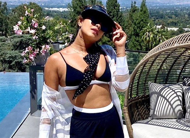 Priyanka Chopra shares 'sundazed' picture as she relaxes by the pool in black bikini top and shorts at her Los Angeles home : Bollywood News - Vimarsana News