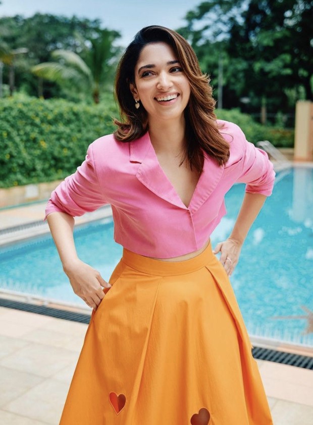 Tamannaah Bhatia nails colour blocking trend, makes statement in pink crop top and tangerine skirt worth Rs. 35K 