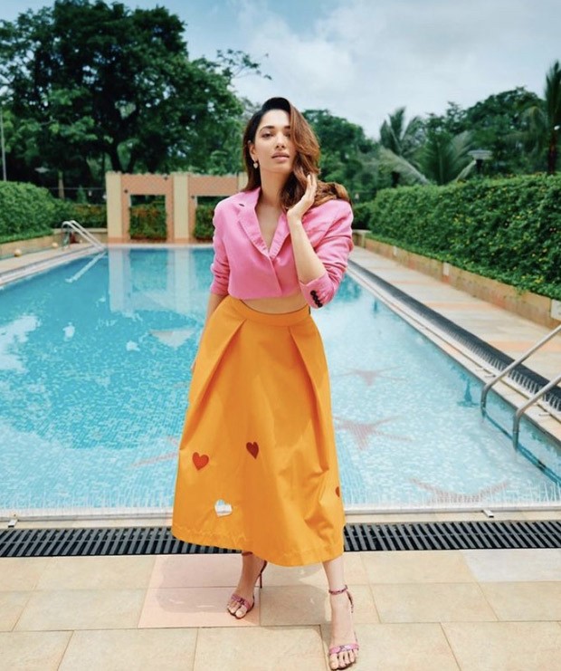 Tamannaah Bhatia nails colour blocking trend, makes statement in pink crop top and tangerine skirt worth Rs. 35K 