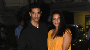 Neha Dhupia and Angad Bedi pose together for paps