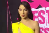 Nora Fatehi flaunts her perfect curves in yellow outfit