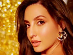 Nora Fatehi looks sizzling hot in red outfit