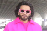 Ranveer Singh look like a flash of bright pink as he poses for paps at airport