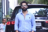 Varun Dhawan looks handsome in a blue shirt and bearded look