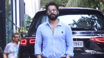 Varun Dhawan looks handsome in a blue shirt and bearded look